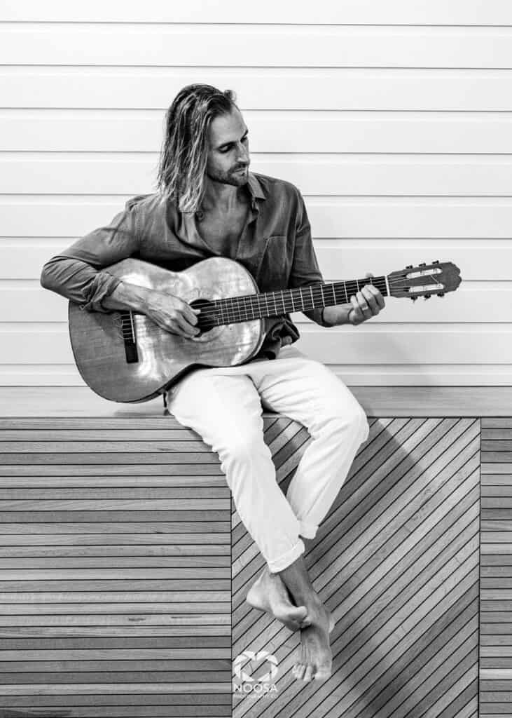 Nick Broadhurst playing guitar