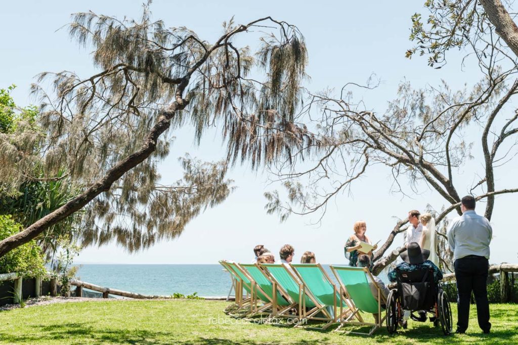 Noosa Photography Co Casuarina Gardens deckchair ceremony floral cushions