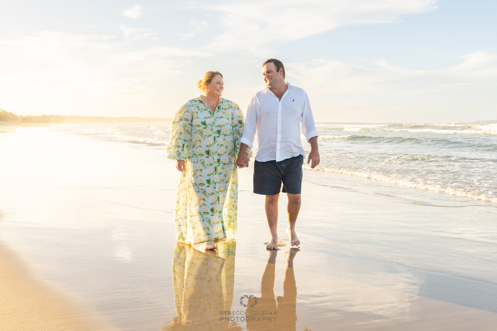 Noosa Photography Co-Couples Couple walking on the beach for a photoshoot
