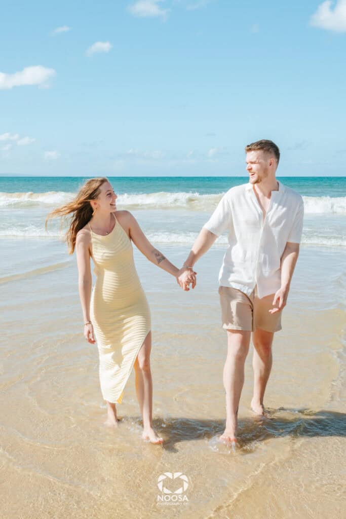 Couple at Noosa Main Beach Surprise Proposal Photography Noosa by Noosa Photography Co