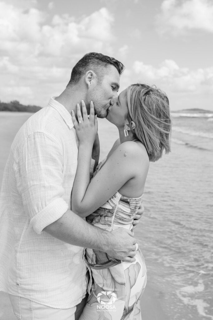 Couple kissing Noosa Main Beach