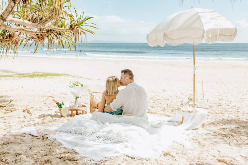 Morning Proposal on Noosa Main Beach by Noosa Photography Co