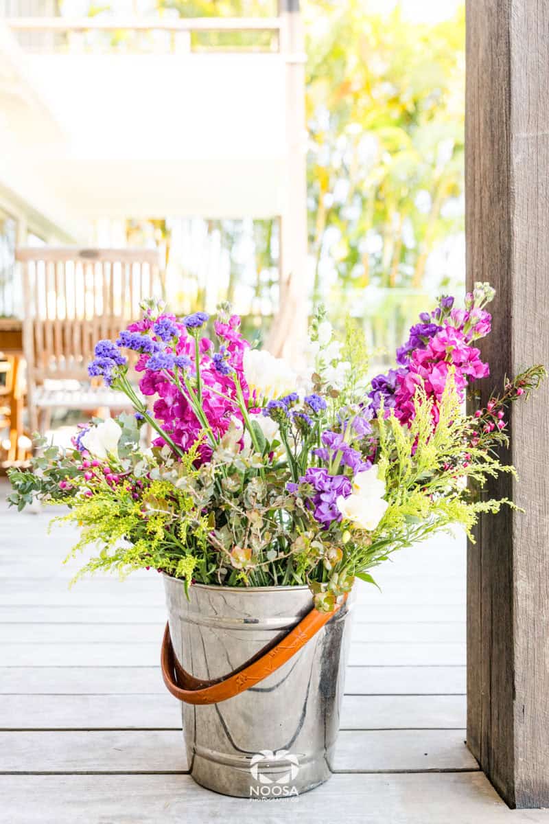Sliver bucket with flowers