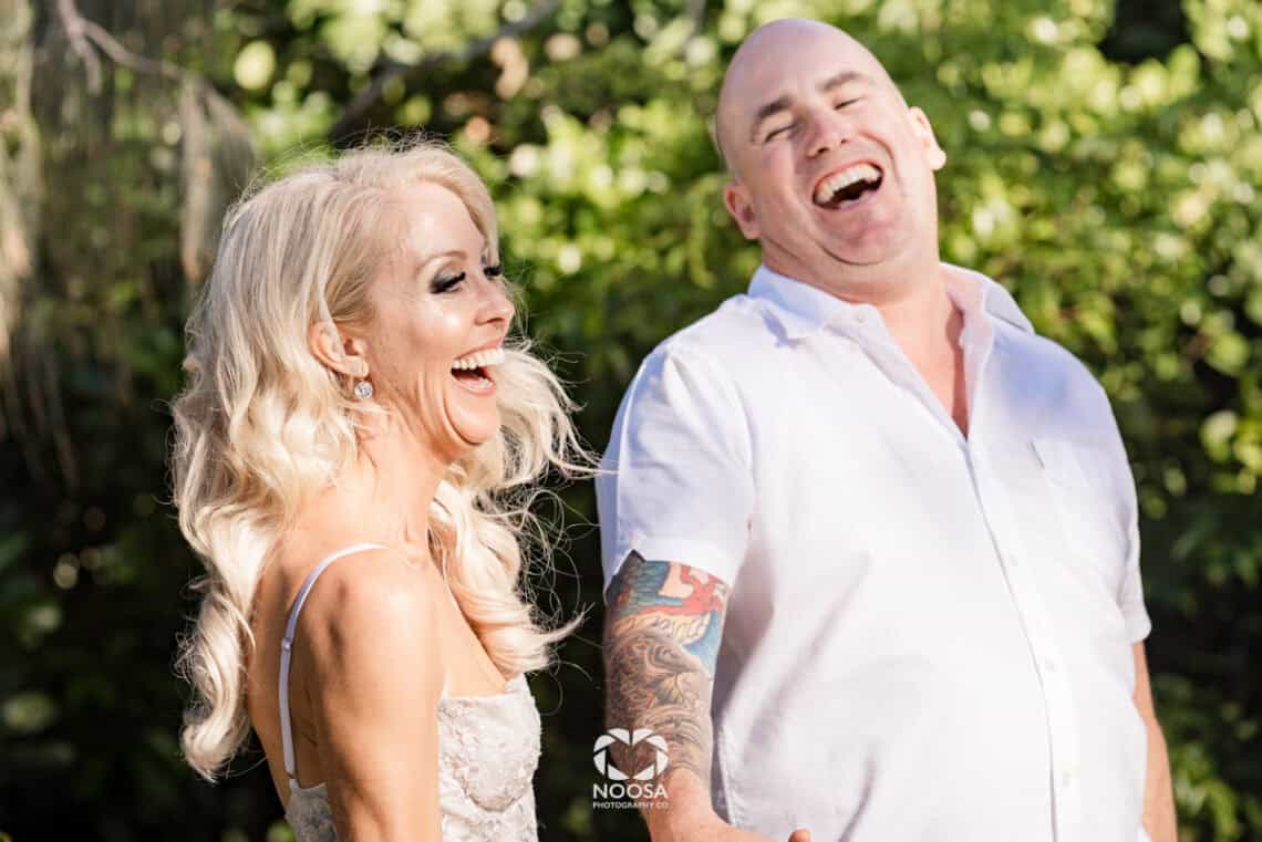 Couple laughing Noosa wedding ceremony